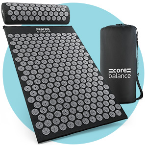acupressure mat and pillow in grey with black bag
